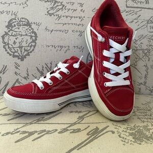 Skechers red arch fit women’s sneakers size 5.5. Like new condition. Washable.